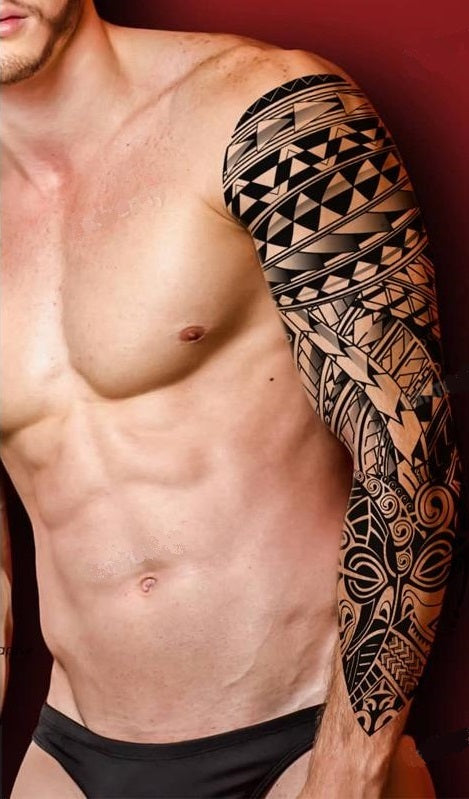 Tatouage bras polynésien liberté absolue